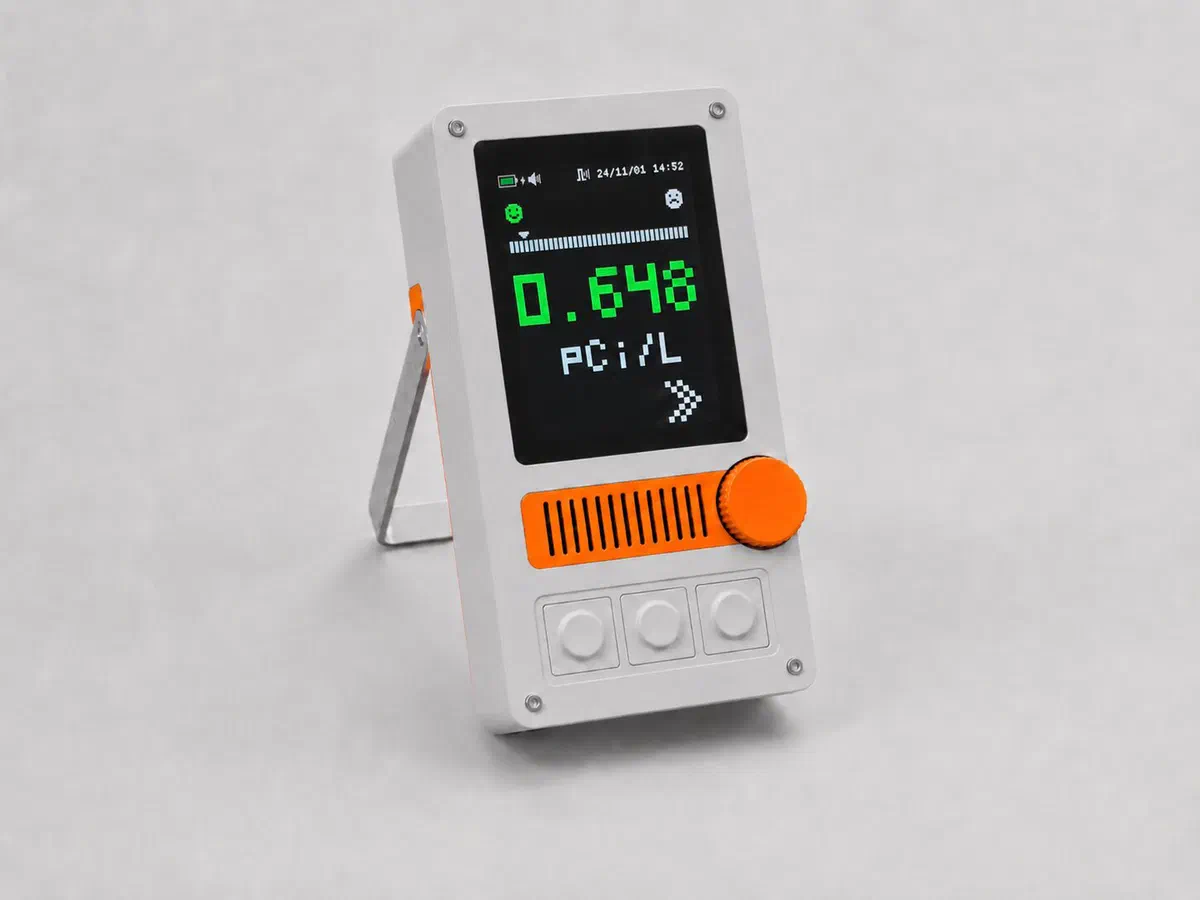 Qorvan Radon S1 monitor showing a radon reading of 0.648 pCi/L